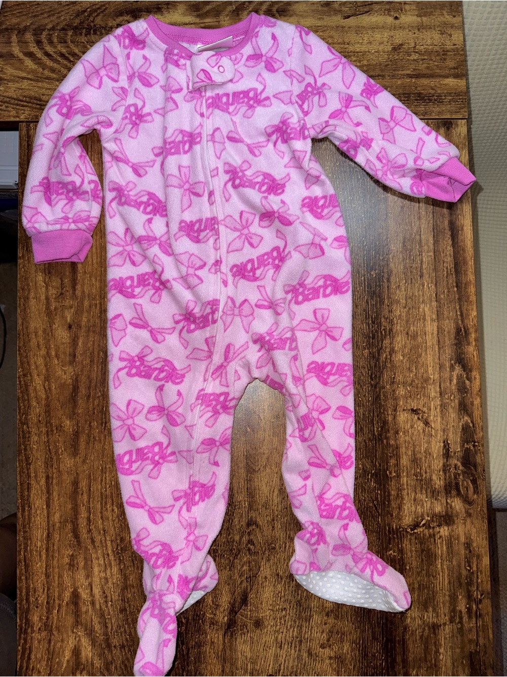 Barbie Pink Bow-Print Fleece One-Piece Footed Pajamas - Kids 12M